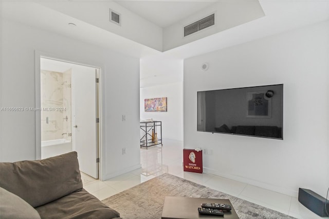 living room with light tile patterned floors