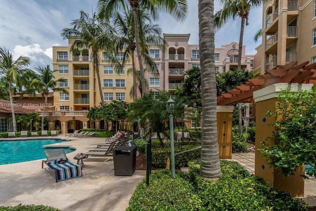 view of pool featuring a patio