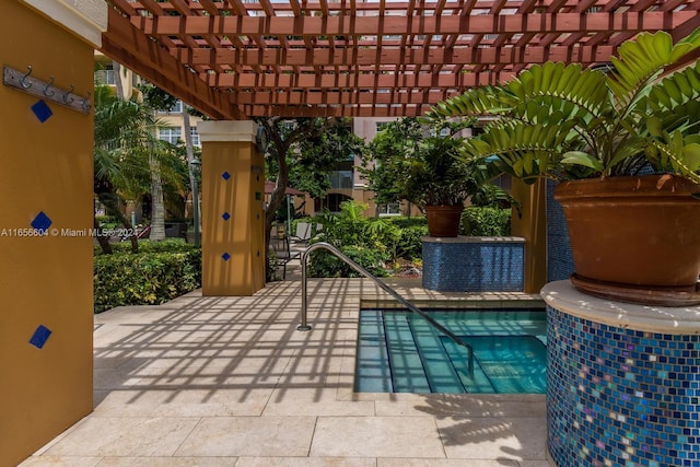 view of swimming pool with a pergola and a patio area