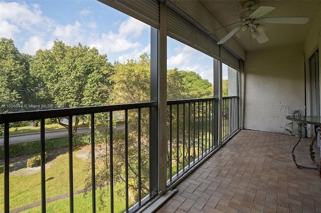 balcony featuring ceiling fan