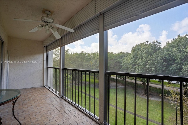 balcony featuring ceiling fan