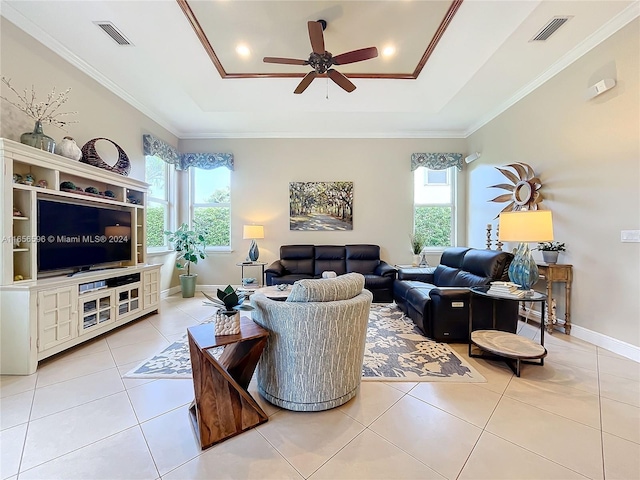 living room featuring crown molding, light tile patterned floors, plenty of natural light, and ceiling fan