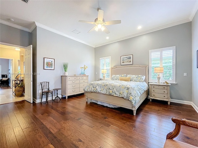 bedroom featuring multiple windows, ceiling fan, and dark hardwood / wood-style flooring