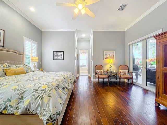 bedroom featuring ceiling fan, multiple windows, dark hardwood / wood-style floors, and access to exterior