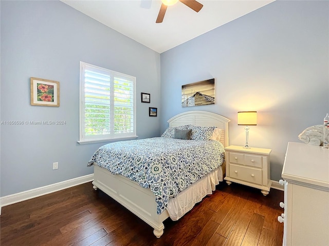 bedroom with dark wood-type flooring and ceiling fan