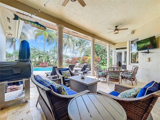 view of patio / terrace with ceiling fan and outdoor lounge area