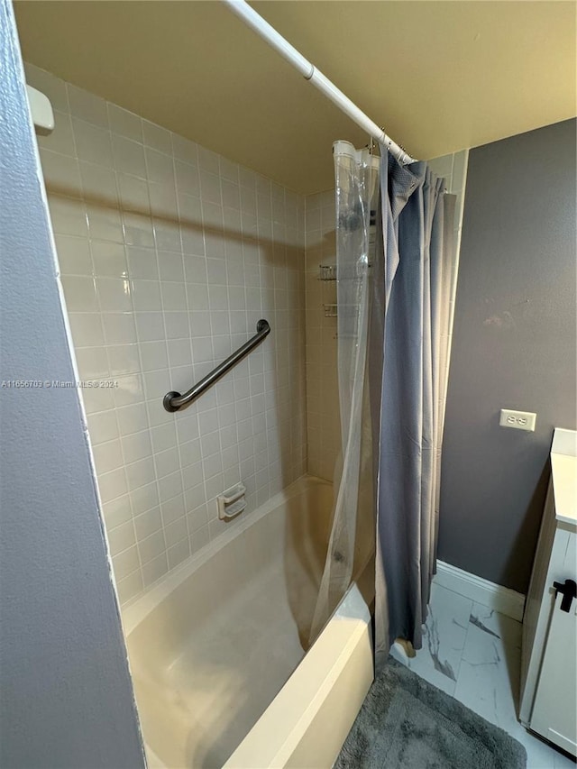 bathroom with vanity and shower / bath combo