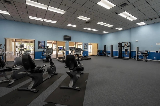 workout area with a drop ceiling