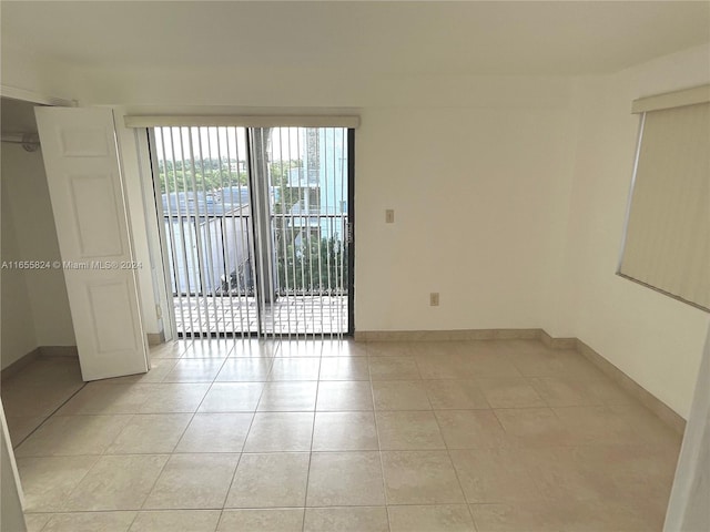 view of tiled spare room