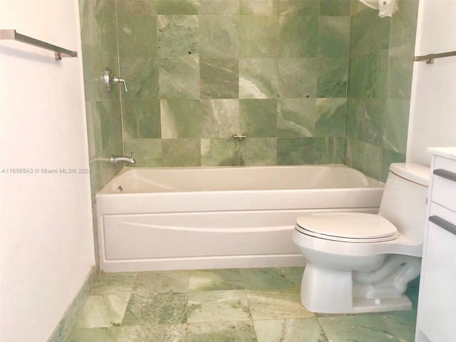 full bathroom featuring vanity, toilet, and tiled shower / bath combo