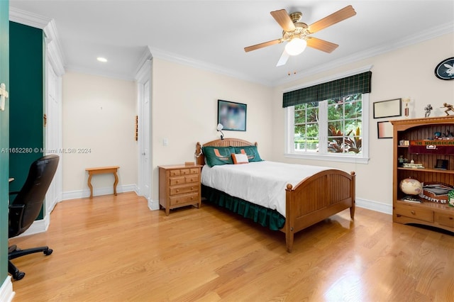 bedroom with wood-type flooring, ornamental molding, and ceiling fan