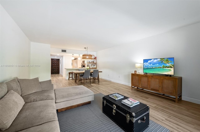 living room with hardwood / wood-style flooring