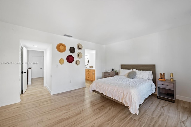 2600 Cardena St Unit 11, Coral Gables, FL 33134 - bedroom featuring light wood finished floors and baseboards