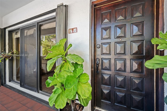 2600 Cardena St Unit 11, Coral Gables, FL 33134 - property entrance with stucco siding