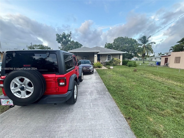 view of side of home featuring a yard