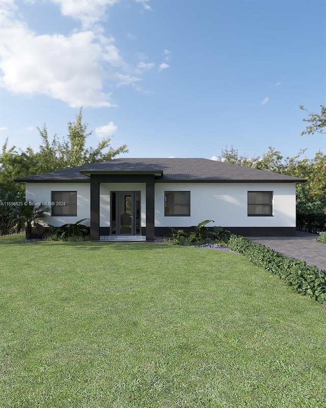 view of front of property featuring a front lawn