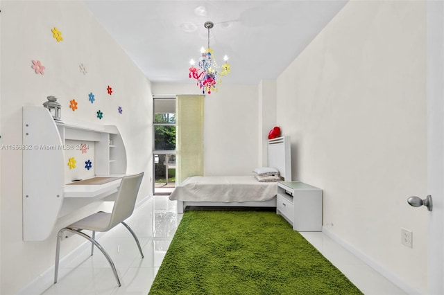 bedroom featuring a chandelier and light tile patterned flooring