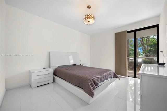 bedroom with light tile patterned floors