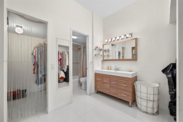 bathroom featuring curtained shower, tile patterned flooring, toilet, and vanity