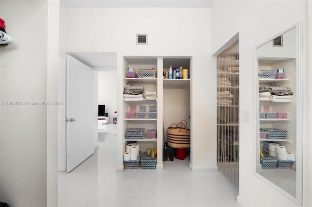 interior space with light tile patterned floors