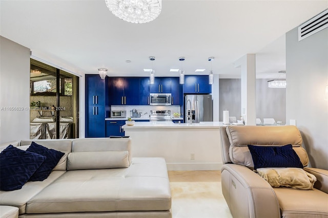 living room featuring an inviting chandelier