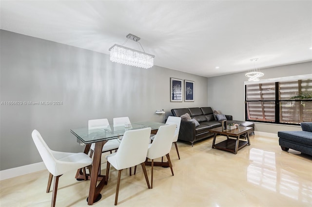 dining room featuring a chandelier