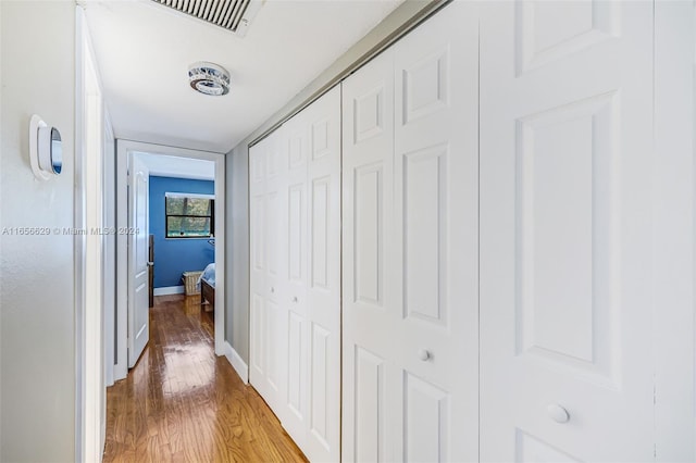 hall featuring light hardwood / wood-style flooring