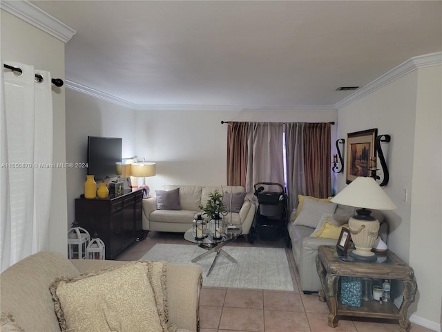 living room featuring ornamental molding and light tile patterned floors