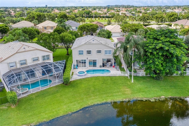 drone / aerial view featuring a water view