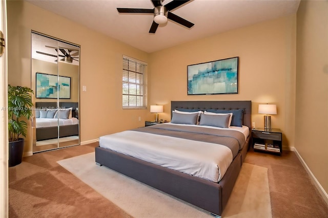 bedroom featuring ceiling fan and carpet flooring