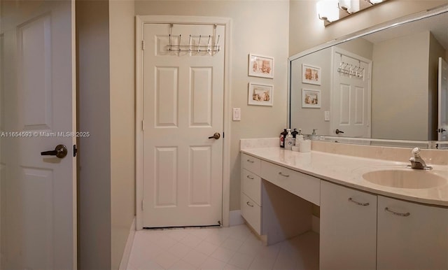 bathroom featuring vanity and tile patterned flooring