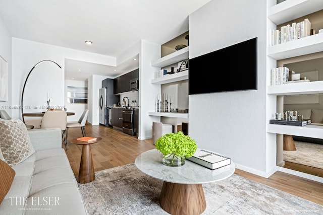 living room with wood-type flooring