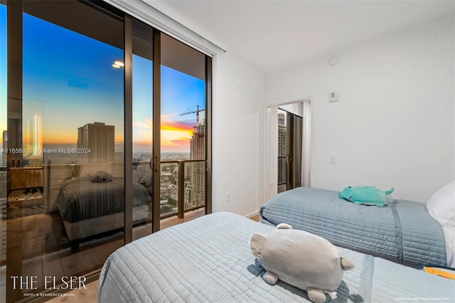 bedroom with wood-type flooring