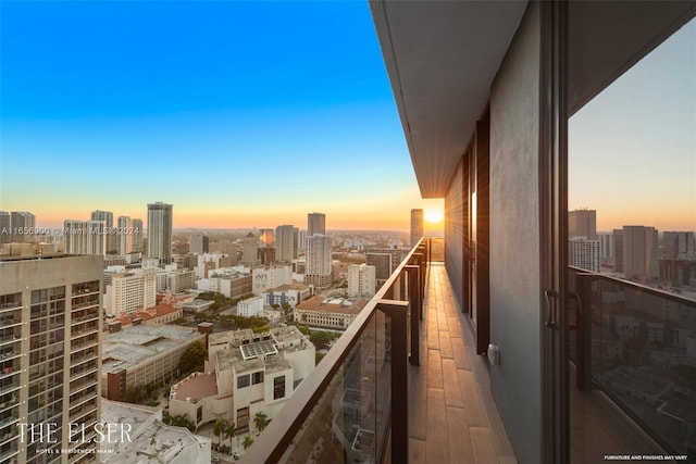 view of balcony at dusk