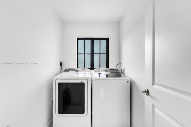 laundry room featuring independent washer and dryer