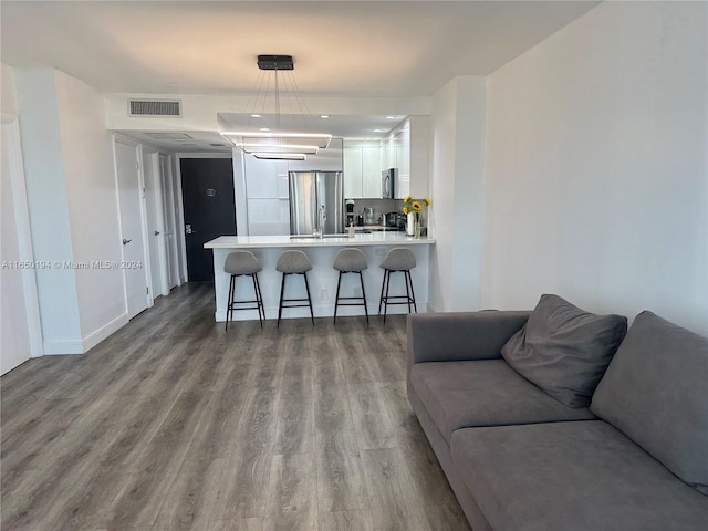 living room with wood-type flooring