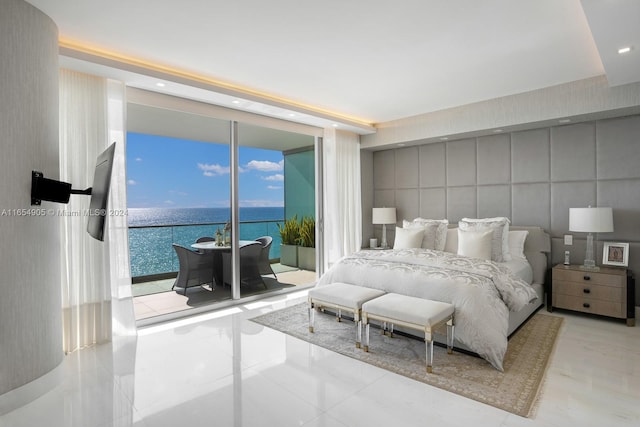 10203 Collins Ave Unit 801, Bal Harbour, FL 33154 - bedroom with a wall of windows, a water view, access to exterior, and tile patterned floors