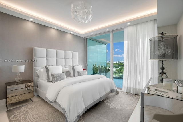 10203 Collins Ave Unit 801, Bal Harbour, FL 33154 - bedroom featuring access to outside, expansive windows, and recessed lighting