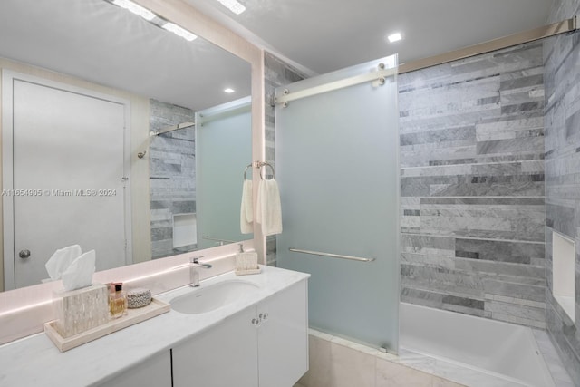 10203 Collins Ave Unit 801, Bal Harbour, FL 33154 - full bathroom with vanity, tiled shower / bath combo, and recessed lighting