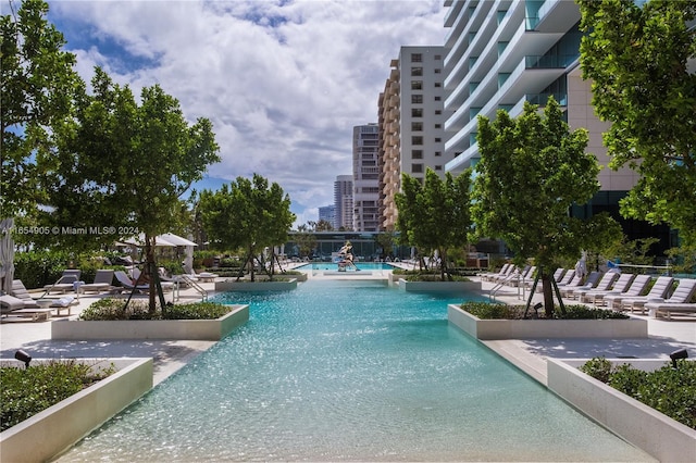 10203 Collins Ave Unit 801, Bal Harbour, FL 33154 - community pool featuring a patio area and a view of city