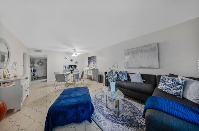 living room featuring ceiling fan