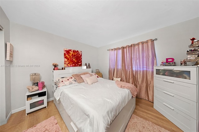 bedroom featuring light hardwood / wood-style floors