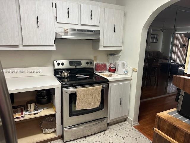 kitchen featuring light hardwood / wood-style floors and stainless steel range with electric cooktop