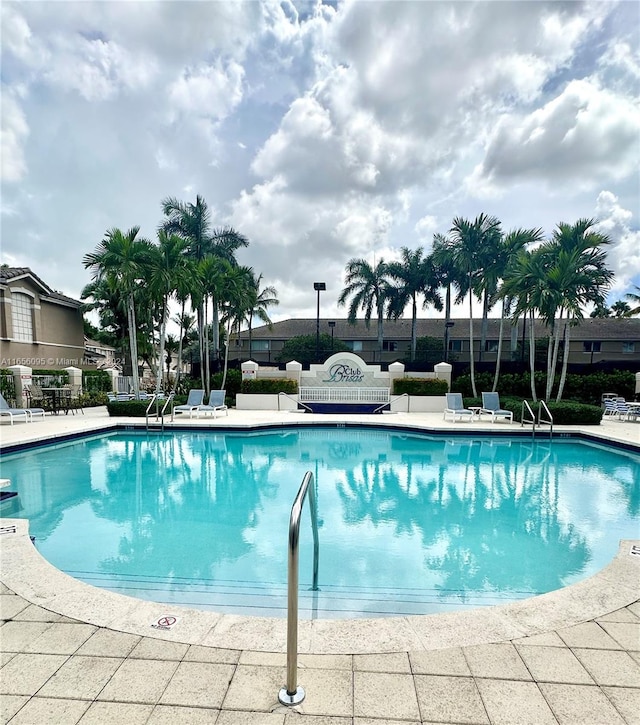 view of swimming pool featuring a patio