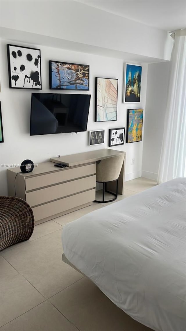 bedroom featuring light tile patterned floors