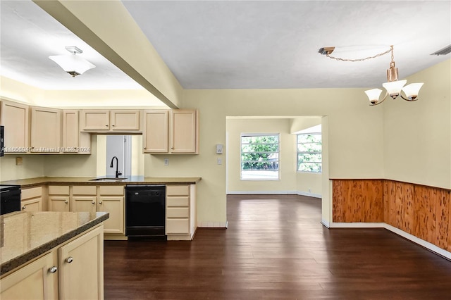 kitchen featuring cream cabinetry, dishwasher, dark hardwood / wood-style floors, and sink