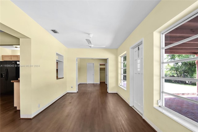 hallway featuring dark hardwood / wood-style flooring