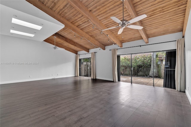 unfurnished room featuring wooden ceiling, vaulted ceiling with skylight, ceiling fan, and dark hardwood / wood-style floors