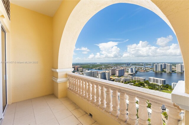 balcony featuring a water view