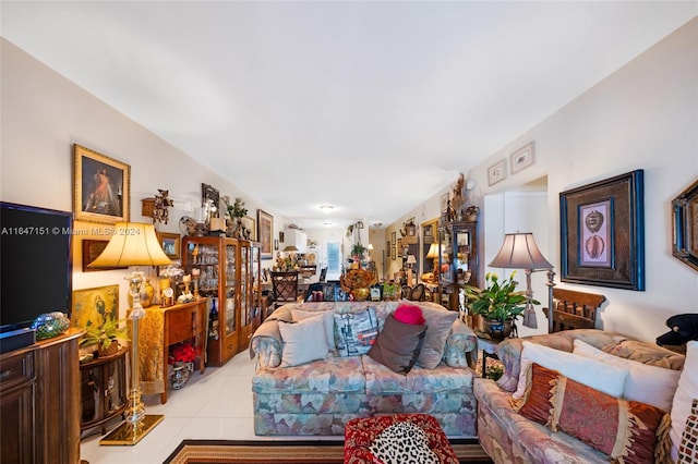 living room with light tile patterned floors